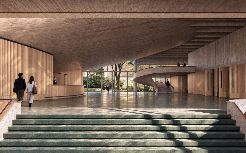 Public foyer and circulation space opening onto the garden at Loures Cultural Centre
